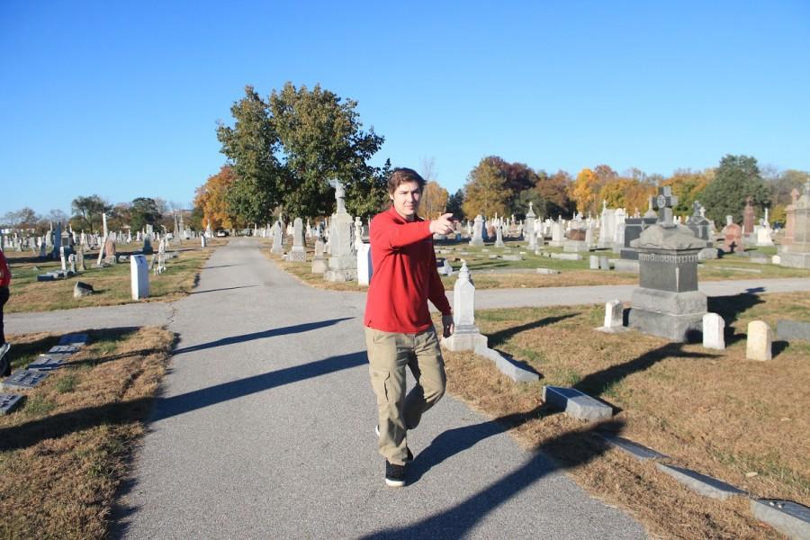 senior Max van Dongen points to a location for a possible good photo.