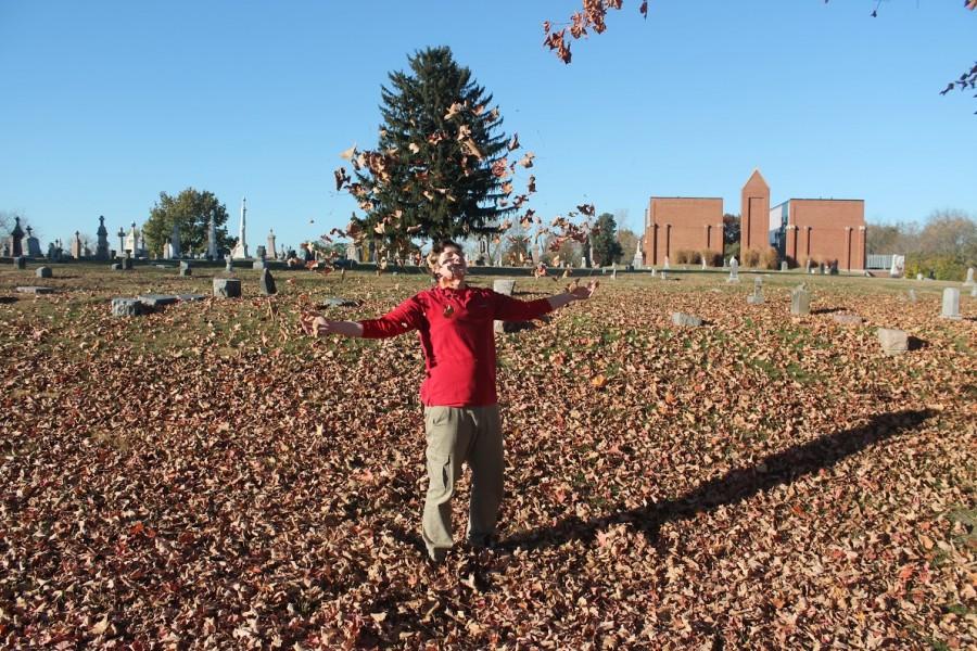 van Dongen throws up leaves in the air for a dramatic photo.