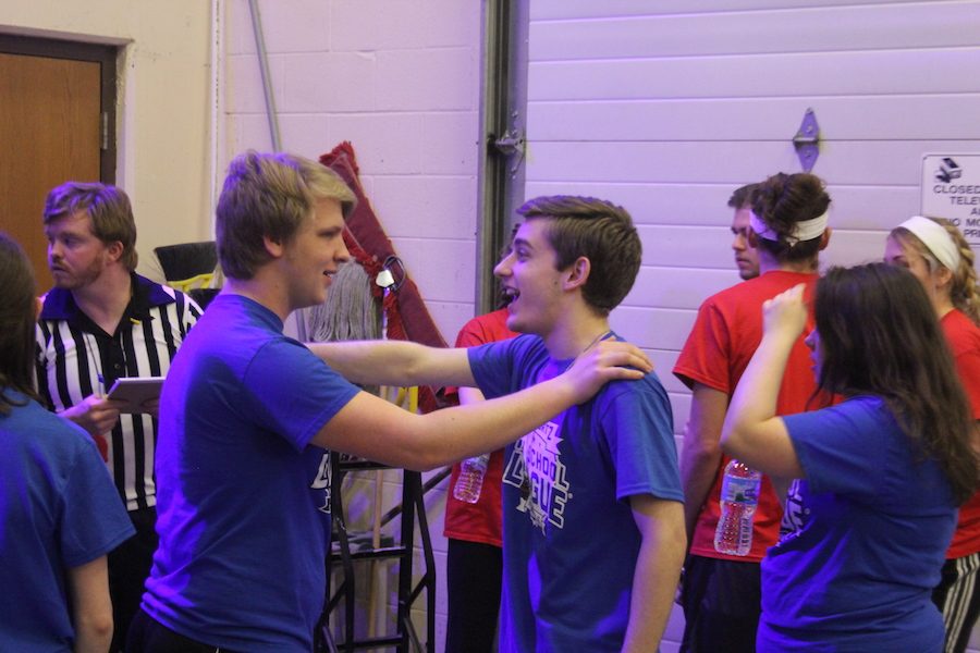 LOTS OF LAUGHS: Seniors Chris Golab and Jeremy Schmidt prepare to go onstage for their first ComdeySportz performance on Wednesday.  The team of seven looks forward to a competitive season this spring.