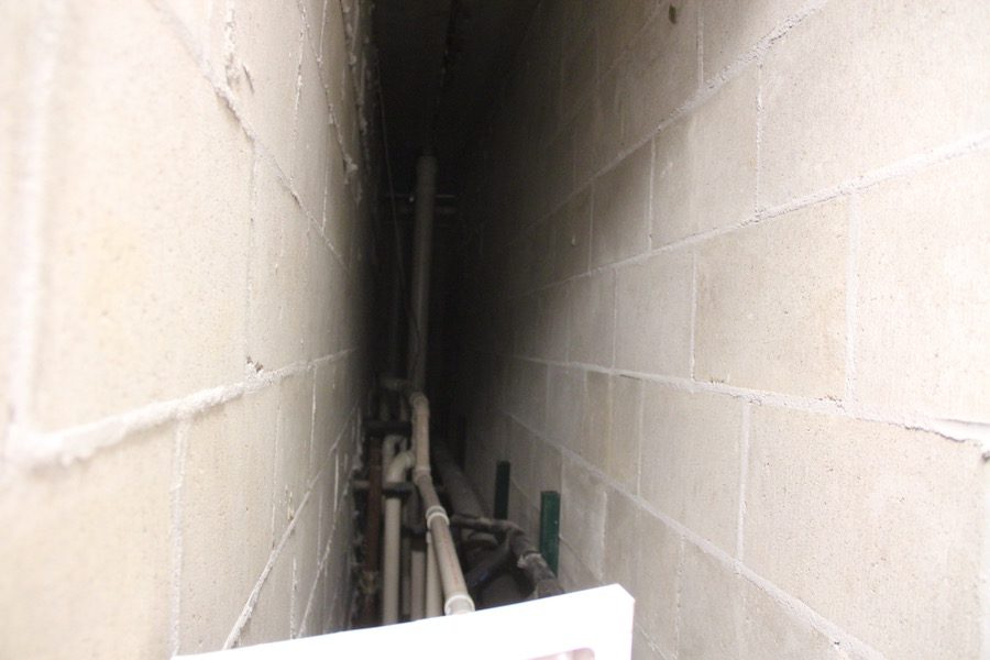 BLACK VOID: This narrow space is accessed through a bathroom closet and is used to house various pipes. The obscurity of its location gives of its charm.