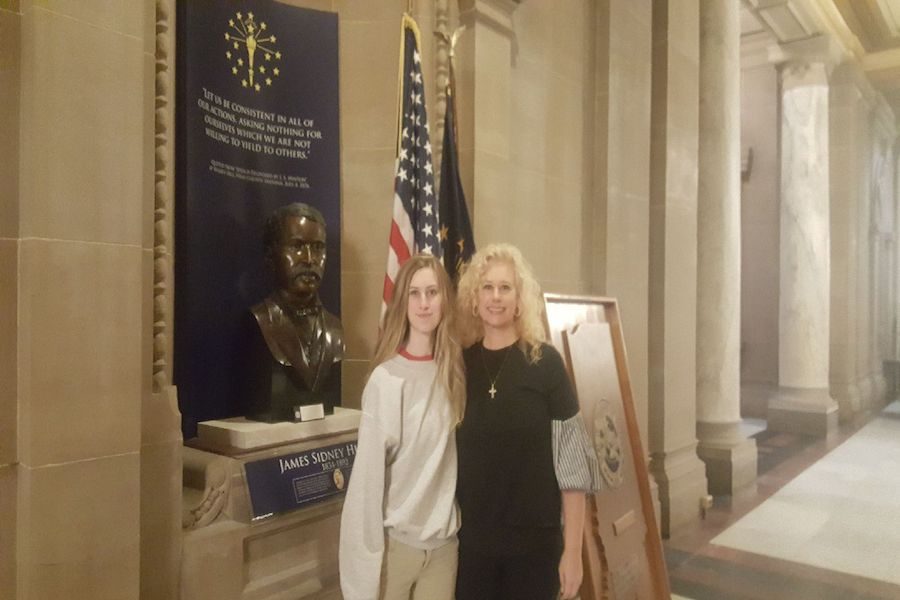 SIDE BY SIDE: Sophomore Paige Moore and her mother, who went to testify as a parent and give moral support, pose in the Indiana Statehouse. Moore said without her mom by her side, she would have been much more nervous during the trial. 
