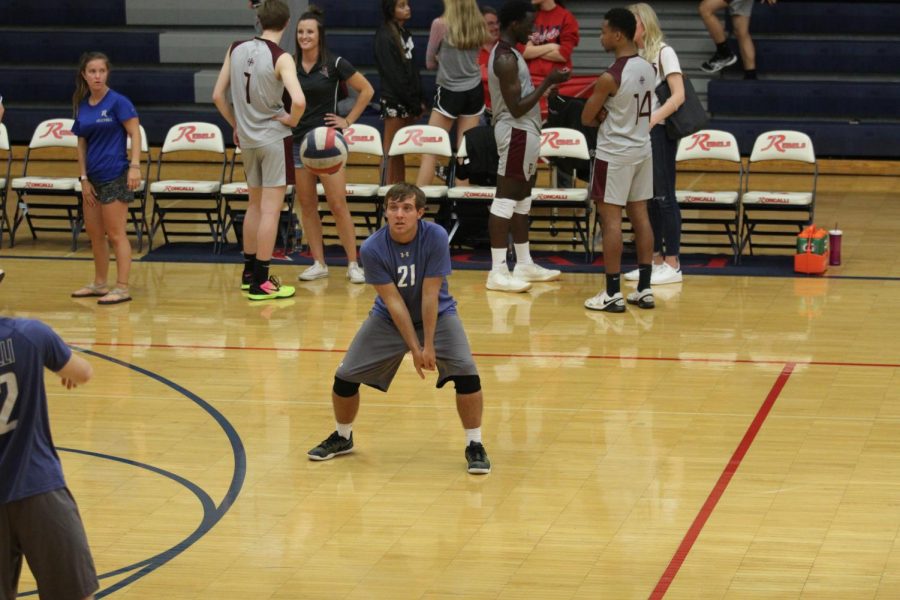 CAN YOU DIG IT: Senior Shane Moylan passes the ball with a teammate before the Metro Tournament hosted in the Woodshed. Moylan and his team won the tournament, advancing them further in the series. 
