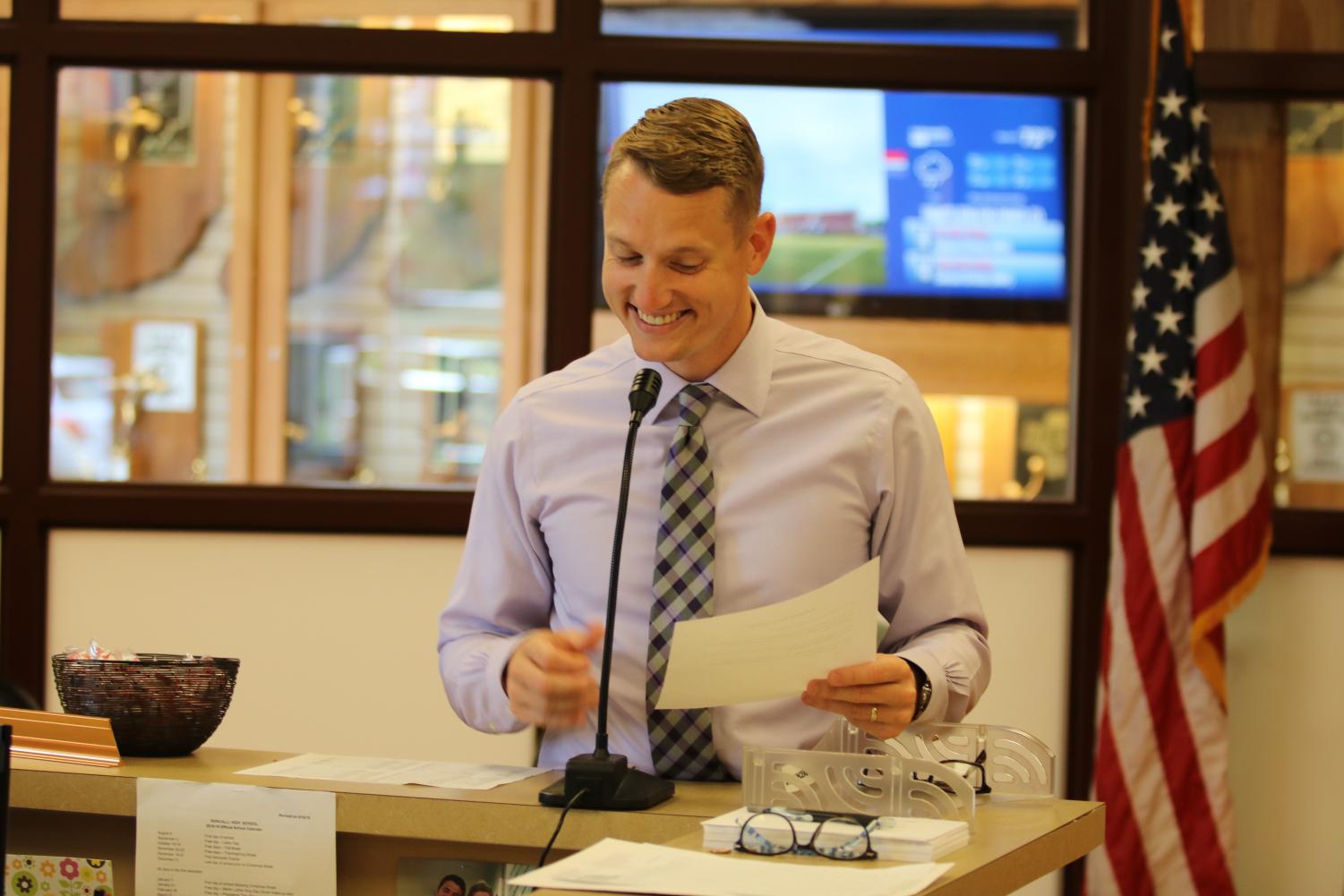 GOOD MORNING RONCALLI: New vice principal Mr. Kevin Banich addresses the school on the announcements. Banich has taken over this role which used to be a responsibility of Mrs. Shellie Hartford