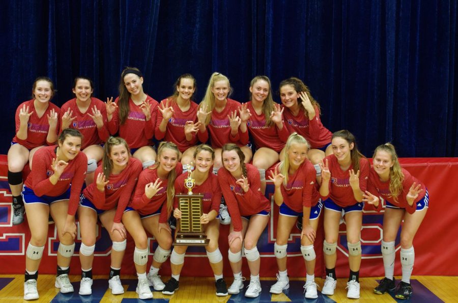 SPORTING+SOME+HARDWARE%3A+The+team+celebrates+its+third+consecutive+Circle+City+Conference+championship.+The+Lady+Rebels+defeated+Brebeuf+to+capture+the+title+