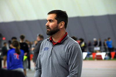 Mr. Litz talking to his team at a Track and Field competition. This competition took place back in 2019 due to the Covid outbreak he did not have a season last year.