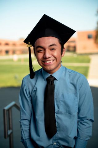 MATRICULATION EXULTATION: Senior Coby García shines a radiant grin for his senior photo. García plans to go on to study bioethics and public policy at Harvard.