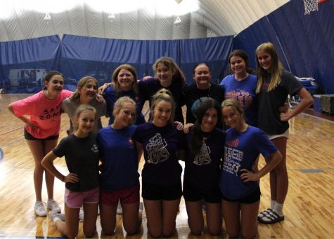 ROYAL SPIRIT: The freshman cheer squad poses for a team photo after an August practice,