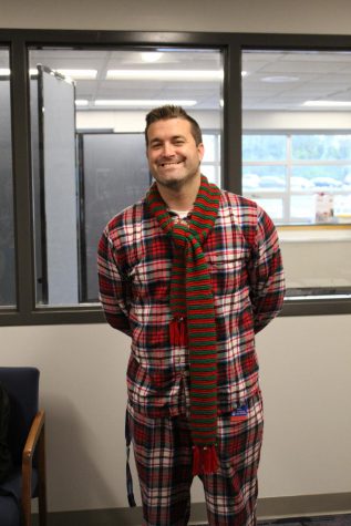 Mr. John Hasty in Christmas pajamas on the first day of homecoming spirit week, Holiday Day.
