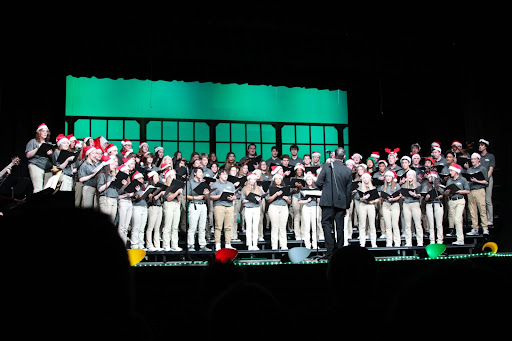 RAISE THE ROOF: Show Choir, Advanced Women’s Chorus, and Intermediate Mixed Chorus pictured above sang arrangements of popular Christmas songs. The combined voices concluded the Tuesday night performance.