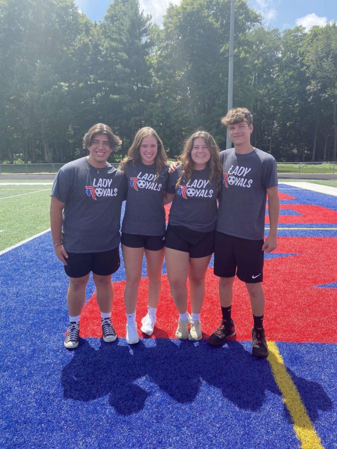 Seniors Evan Meer, Emma Loebig, Meredith Bean, and Anthony Paynter serve as managers to the girls soccer team.