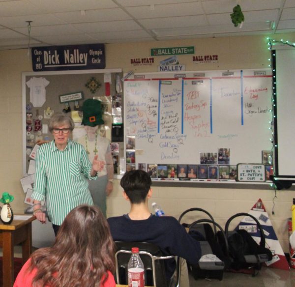 THE BEST HOLIDAY: Health teacher, Mrs. Kathy Schembra, teaches her 6th period
heatlh class during the first week of March. Throughout the entire month of March,
Schembra dresses in a green outfit every day to commemorate the feast day of St.
Patrick.