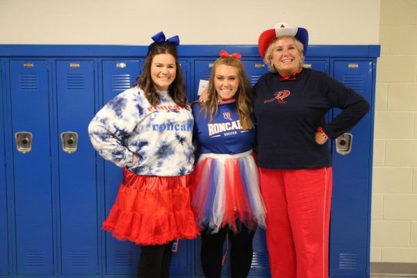 Staff Katie Hibner, Lacey Hersman, and Angie Toner all dressed up for red, white, and blue spirit day from the 2023-24 school year. 