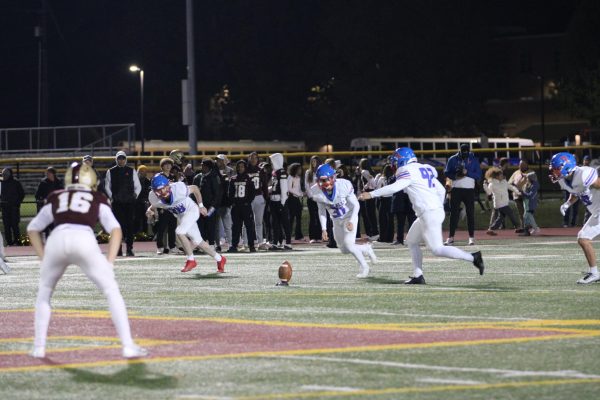 Junior kicker Gavin Louthain kicks off after a Royal score in the sectional semi final game against Brebeuf. Louthain kicked a 45-yard field goal later in the game which Roncalli won 55-27.