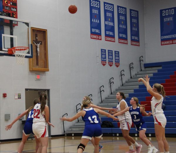 At the November 13th Roncalli versus Bishop Chatard game freshman Lucy Swartz shoots a free throw. 