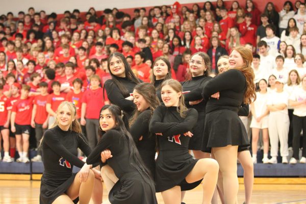 Members of last year's dance team perform at the winter pep rally during Catholic School's Week.