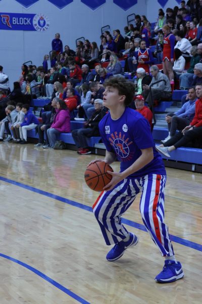 Sophomore Will Hegwood warms up before the New Pal game.