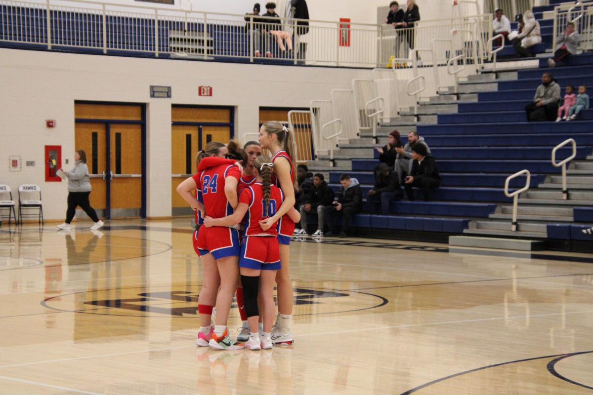 Captains of the team get ready to play their game against the number one seed Lawrence North