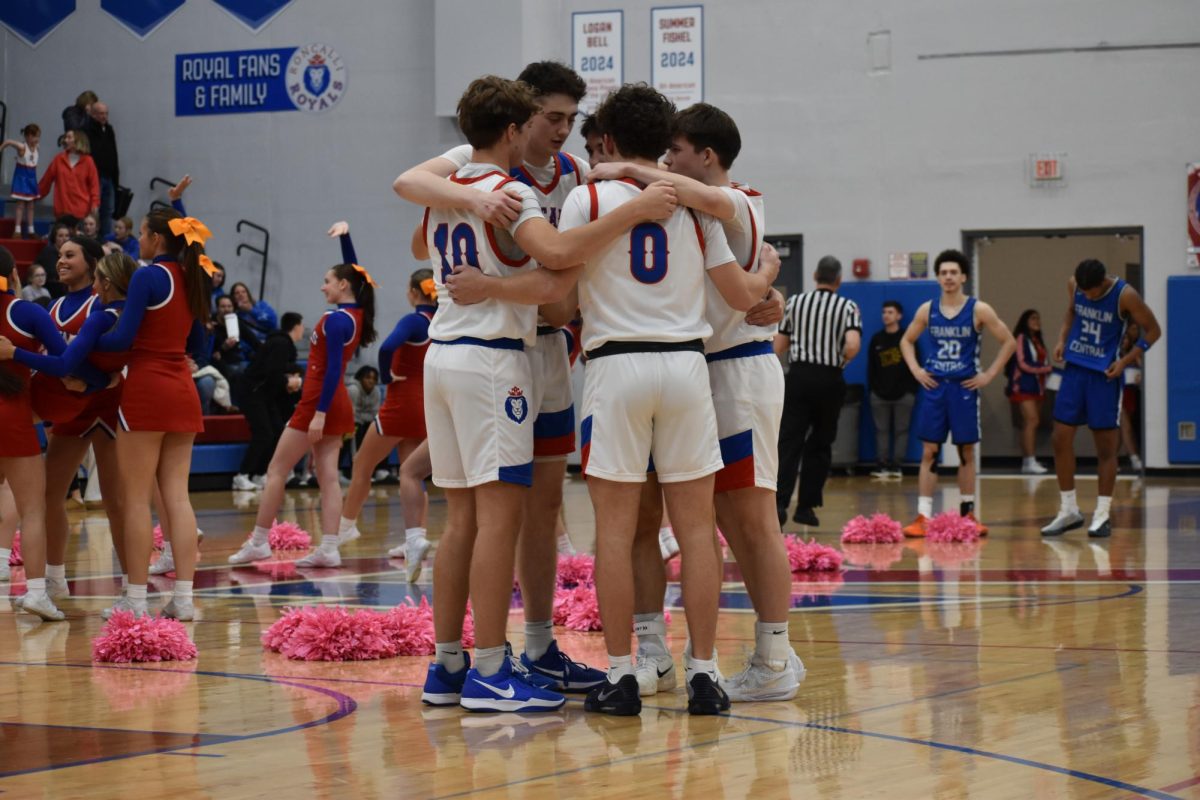 During the Cancer Awareness game against Franklin Central, the team was huddled up motivating each other and deciding what to do next. The Royals did not win however.